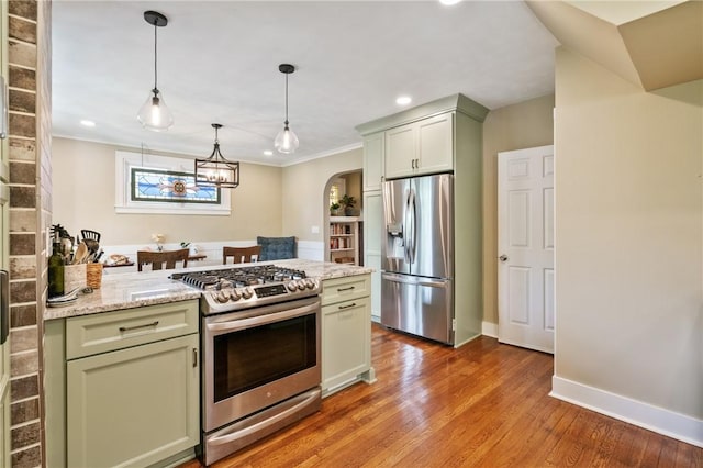 1403 Creedmoor Ave, Brookline, PA 15226 - kitchen featuring appliances with stainless steel finishes, arched walkways, a peninsula, pendant lighting, and recessed lighting