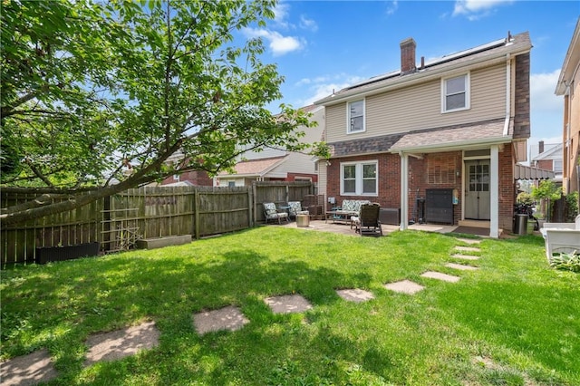 1403 Creedmoor Ave, Brookline, PA 15226 - back of property featuring a patio, brick siding, a chimney, and an outdoor living space
