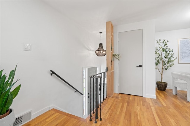 127 Greenview Dr, Penn Hills, PA 15147 - stairs featuring wood finished floors and baseboards