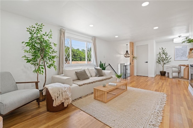 127 Greenview Dr, Penn Hills, PA 15147 - living area with light wood-style floors and recessed lighting