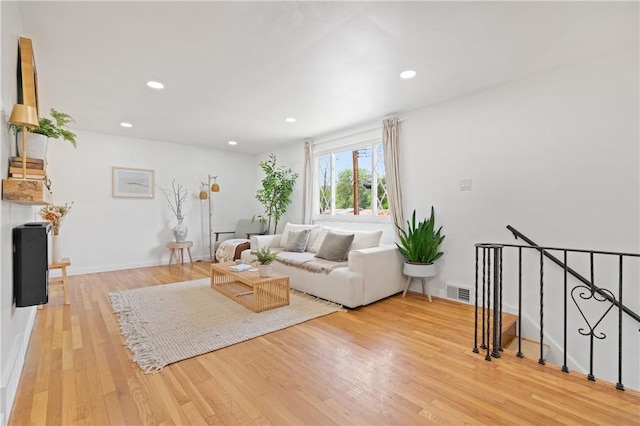 127 Greenview Dr, Penn Hills, PA 15147 - living area with light wood-type flooring, recessed lighting, and baseboards