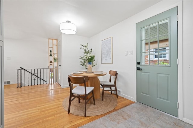 127 Greenview Dr, Penn Hills, PA 15147 - dining room with baseboards and light wood-style floors