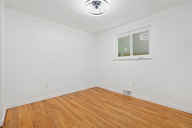127 Greenview Dr, Penn Hills, PA 15147 - spare room featuring baseboards and light wood-type flooring
