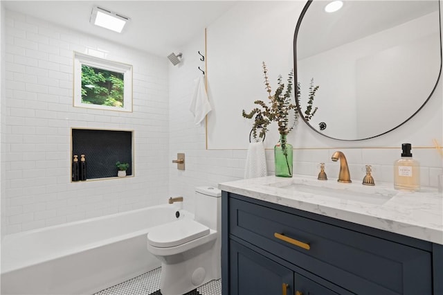127 Greenview Dr, Penn Hills, PA 15147 - full bathroom featuring vanity, toilet, bathtub / shower combination, tile walls, and tile patterned flooring