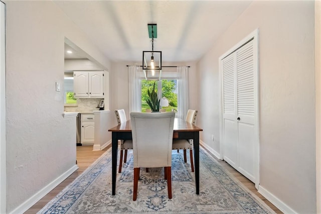 208 Chan Mowr Dr, Middlesex Twp, PA 16059 - dining area with light wood finished floors and baseboards
