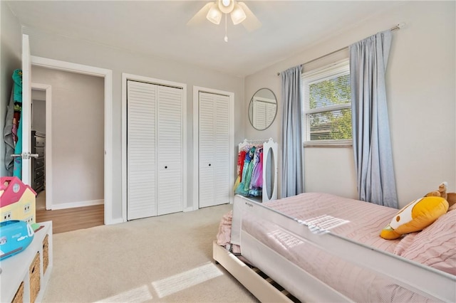 208 Chan Mowr Dr, Middlesex Twp, PA 16059 - bedroom featuring two closets, carpet floors, baseboards, and ceiling fan