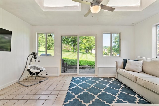 208 Chan Mowr Dr, Middlesex Twp, PA 16059 - living room featuring light tile patterned floors, baseboards, and ceiling fan
