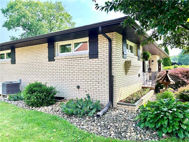 206 Richards Dr, Derry Twp, PA 15650 - view of property exterior featuring central AC unit and brick siding