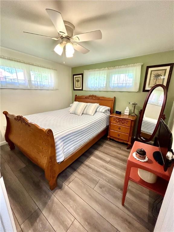 206 Richards Dr, Derry Twp, PA 15650 - bedroom featuring light wood-style floors and ceiling fan