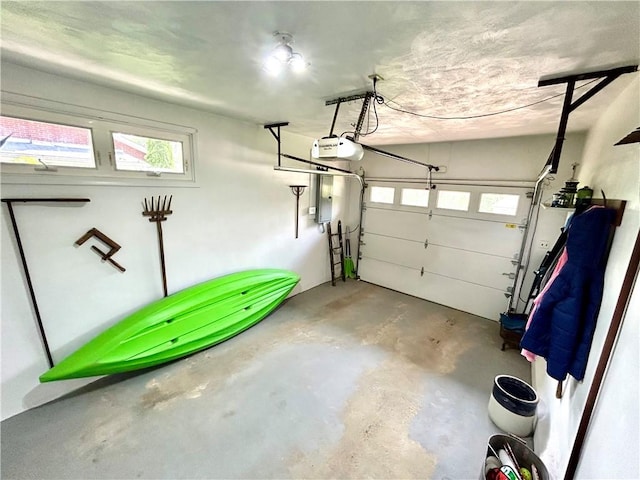 206 Richards Dr, Derry Twp, PA 15650 - garage with a garage door opener and electric panel