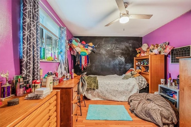 3804 Cynthia Dr, Baldwin Boro, PA 15227 - bedroom with wood finished floors, a ceiling fan, and an accent wall