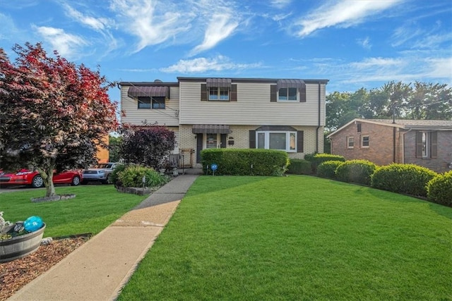 3804 Cynthia Dr, Baldwin Boro, PA 15227 - view of front of house featuring brick siding and a front lawn