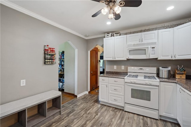 801 4th St N, Versailles, PA 15137 - kitchen featuring white appliances, ornamental molding, a ceiling fan, arched walkways, and white cabinets