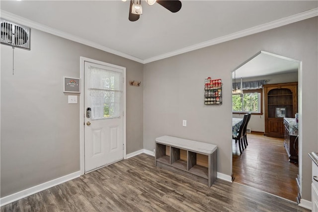 801 4th St N, Versailles, PA 15137 - foyer featuring a ceiling fan, wood finished floors, crown molding, and baseboards