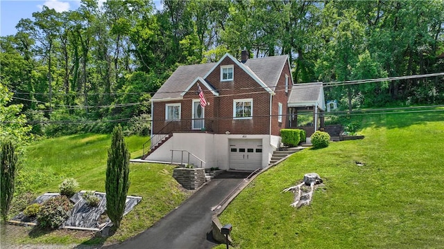 801 4th St N, Versailles, PA 15137 - view of front of property featuring stairs, driveway, a garage, a front lawn, and a chimney
