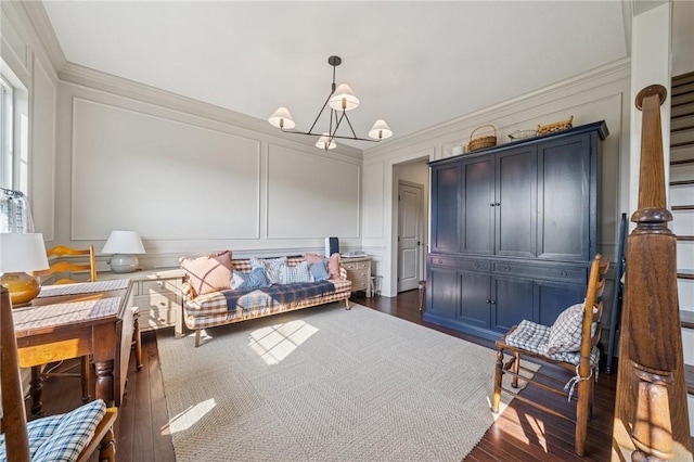 108 Berkshire Ct, Ohio Twp, PA 15237 - bedroom with a decorative wall, a chandelier, dark wood-style floors, and crown molding