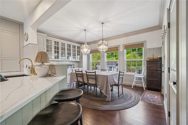 108 Berkshire Ct, Ohio Twp, PA 15237 - dining room with dark wood-type flooring, a decorative wall, and ornamental molding