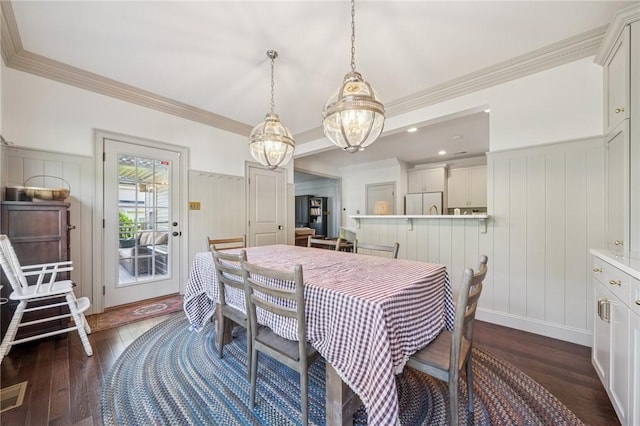 108 Berkshire Ct, Ohio Twp, PA 15237 - dining space with a chandelier, dark wood-type flooring, a decorative wall, crown molding, and wainscoting