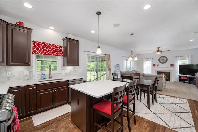 565 Tara Ct, Saxonburg Boro, PA 16056 - kitchen with a sink, ceiling fan, dark brown cabinetry, light countertops, and recessed lighting