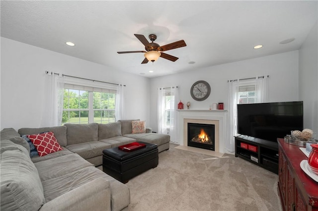 565 Tara Ct, Saxonburg Boro, PA 16056 - living room with a ceiling fan, light colored carpet, a fireplace with flush hearth, and recessed lighting
