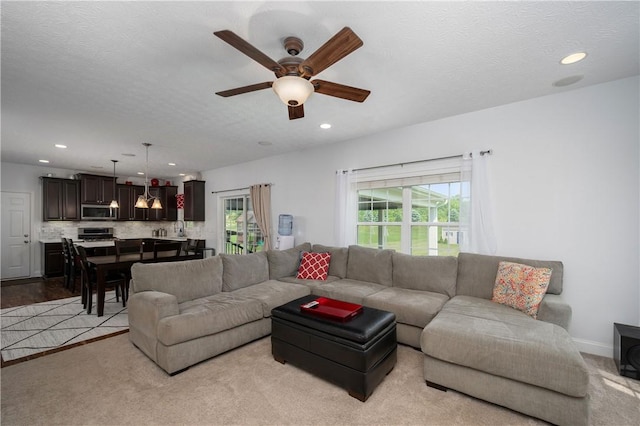 565 Tara Ct, Saxonburg Boro, PA 16056 - living area with ceiling fan, recessed lighting, baseboards, and light carpet