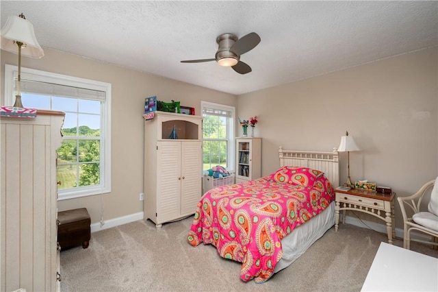 565 Tara Ct, Saxonburg Boro, PA 16056 - bedroom with carpet floors, baseboards, a ceiling fan, and a textured ceiling