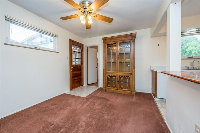 102 Jordan St, Bethel Park, PA 15102 - foyer entrance with light colored carpet, a ceiling fan, and baseboards