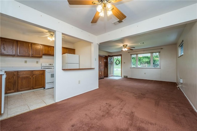 102 Jordan St, Bethel Park, PA 15102 - unfurnished living room with light carpet, ceiling fan, and baseboards