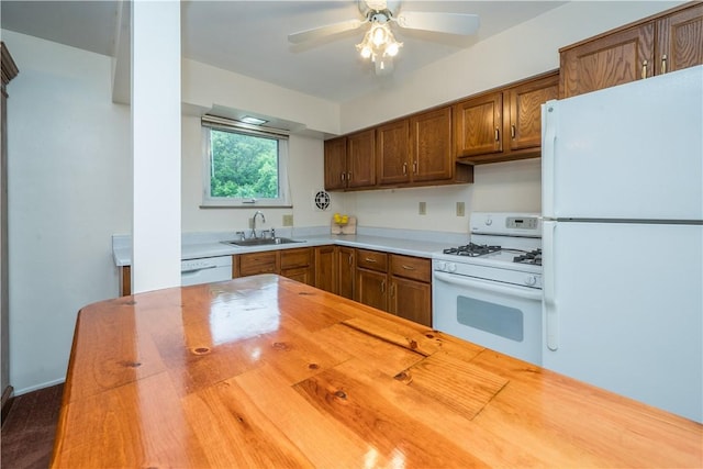 102 Jordan St, Bethel Park, PA 15102 - kitchen featuring white appliances, butcher block countertops, a sink, ceiling fan, and brown cabinetry