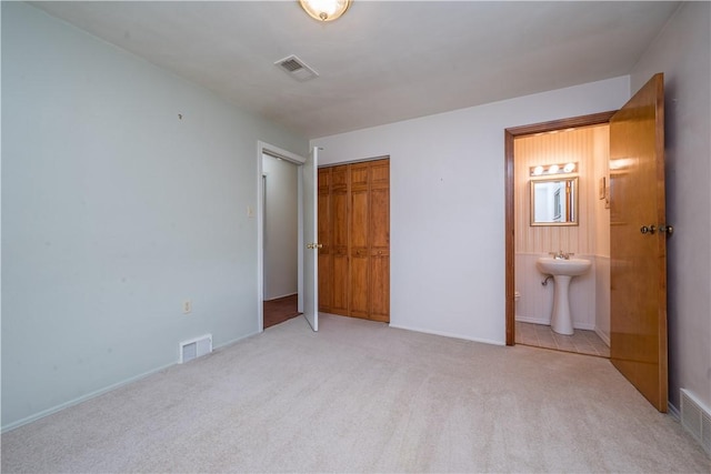 102 Jordan St, Bethel Park, PA 15102 - unfurnished bedroom featuring carpet flooring, a sink, a closet, and connected bathroom