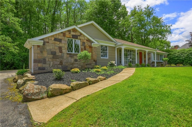 9 Victoria Dr, Neshannock Twp, PA 16105 - single story home with stone siding and a front yard