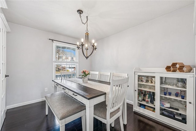 536 Cherryhill Dr, Cecil, PA 15017 - dining room featuring a chandelier, dark wood finished floors, and baseboards