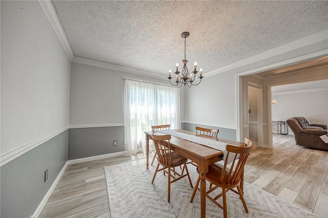 4822 W State St, Mahoning Twp Law, PA 16116 - dining room featuring a chandelier, light wood-style flooring, ornamental molding, a textured ceiling, and baseboards