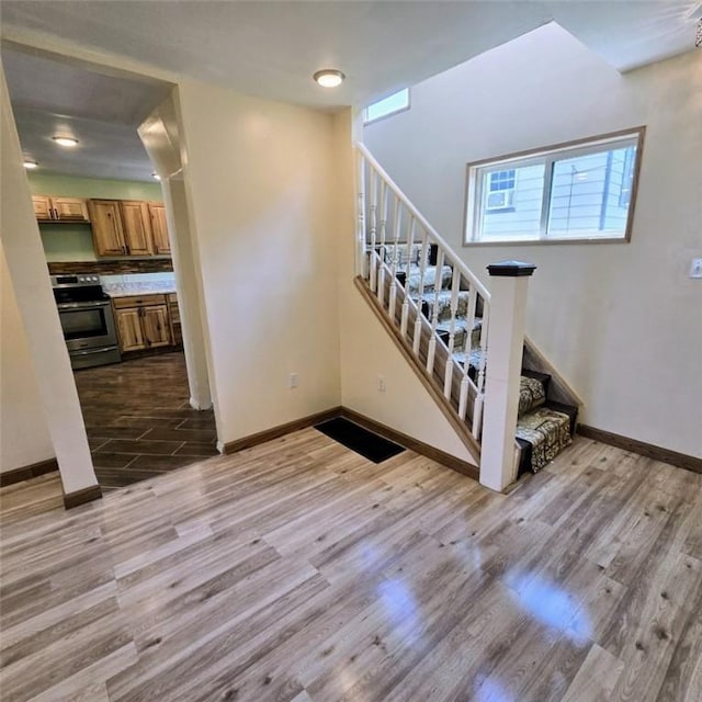 1911 Carolyn St, Farrell, PA 16121 - stairway featuring wood finished floors and baseboards