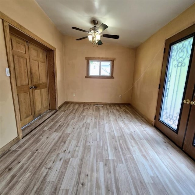 1911 Carolyn St, Farrell, PA 16121 - unfurnished bedroom featuring light wood-style flooring, baseboards, and a ceiling fan