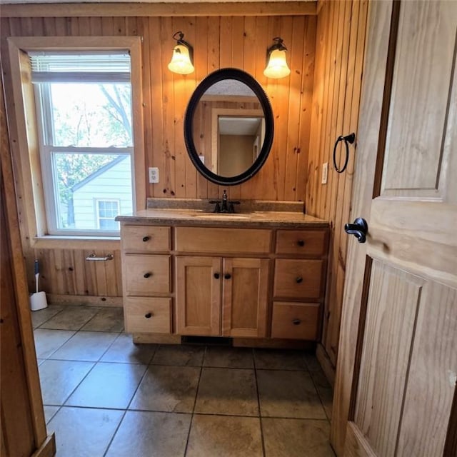 1911 Carolyn St, Farrell, PA 16121 - bathroom with wooden walls, vanity, and tile patterned flooring