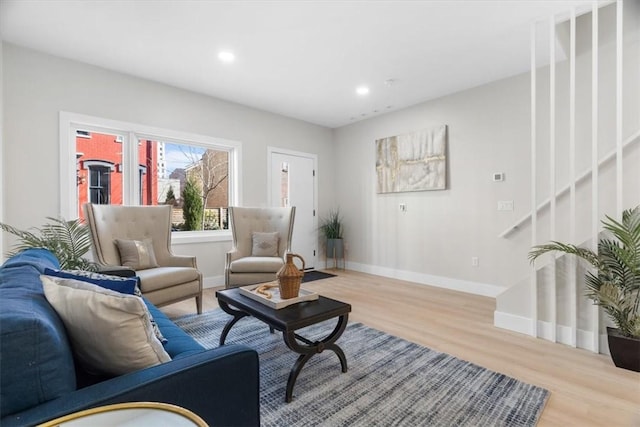 1213 Boyle St, Central North Side, PA 15212 - living room with stairs, wood finished floors, baseboards, and recessed lighting