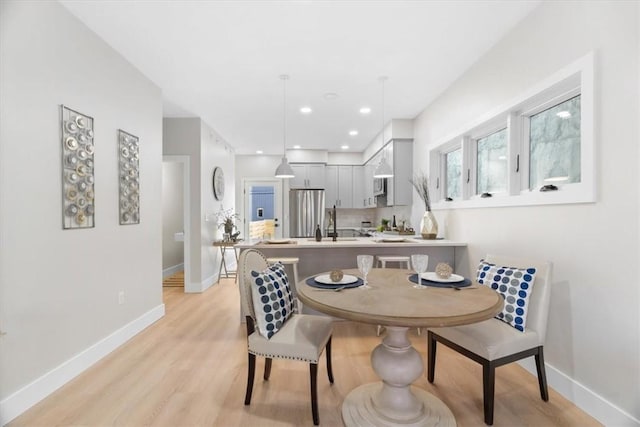 1213 Boyle St, Central North Side, PA 15212 - dining space with light wood finished floors, baseboards, and recessed lighting