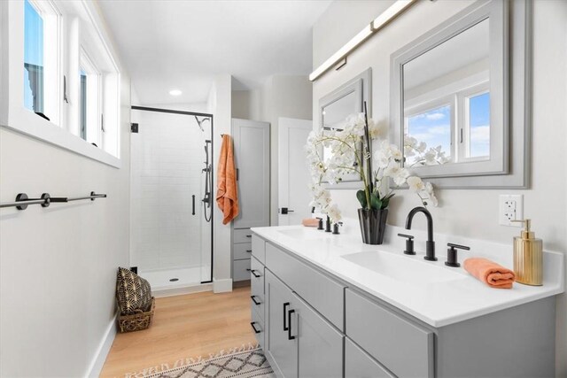 1213 Boyle St, Central North Side, PA 15212 - full bath featuring double vanity, a shower stall, wood finished floors, baseboards, and recessed lighting