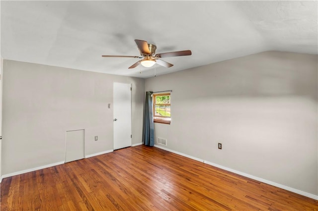 582 Brinwood Ave, Baldwin Boro, PA 15227 - empty room with ceiling fan, wood finished floors, baseboards, and vaulted ceiling