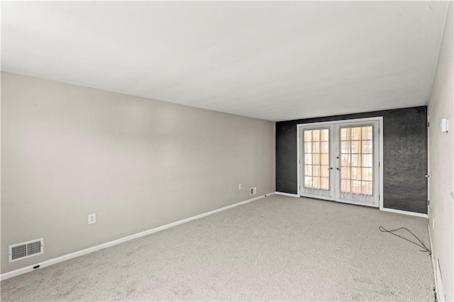 582 Brinwood Ave, Baldwin Boro, PA 15227 - empty room with french doors, carpet flooring, and baseboards