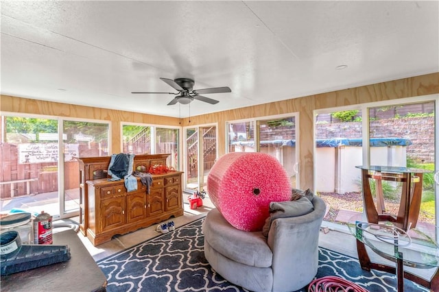582 Brinwood Ave, Baldwin Boro, PA 15227 - sunroom with ceiling fan and wooden walls