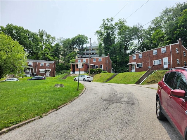 305 Charles Ter, Jeannette, PA 15644 - view of asphalt street featuring curbs