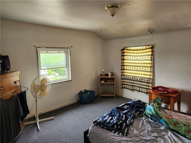 305 Charles Ter, Jeannette, PA 15644 - carpeted bedroom featuring vaulted ceiling and baseboards