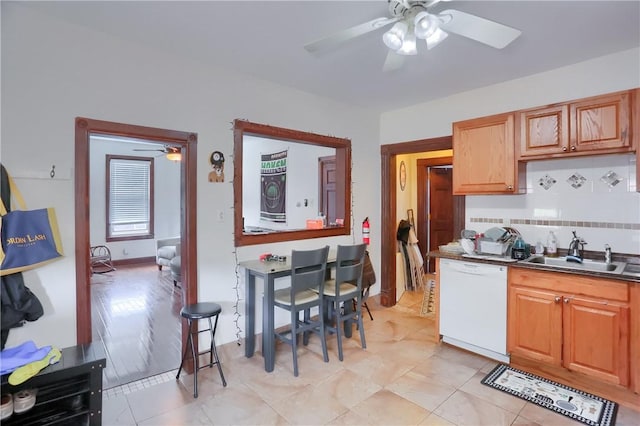 21 S Harrison Ave, Bellevue, PA 15202 - kitchen featuring white dishwasher, a ceiling fan, a sink, and dark countertops