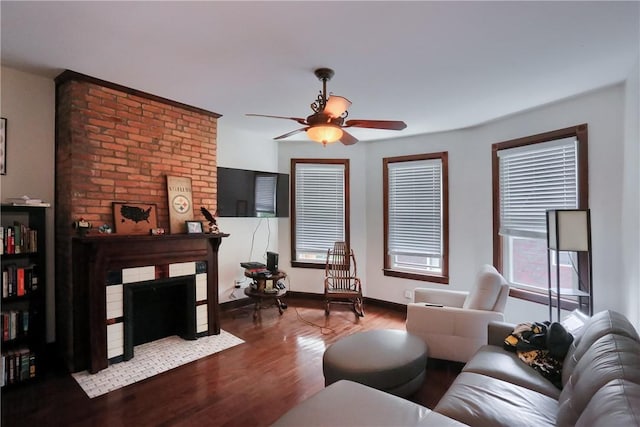 21 S Harrison Ave, Bellevue, PA 15202 - living area featuring a ceiling fan, wood finished floors, a fireplace, and baseboards