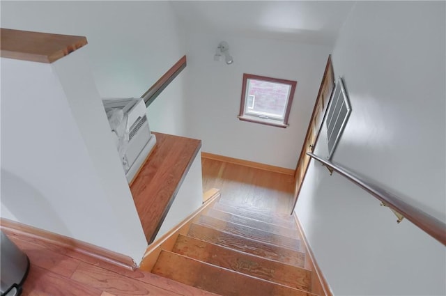21 S Harrison Ave, Bellevue, PA 15202 - stairs featuring wood finished floors and baseboards