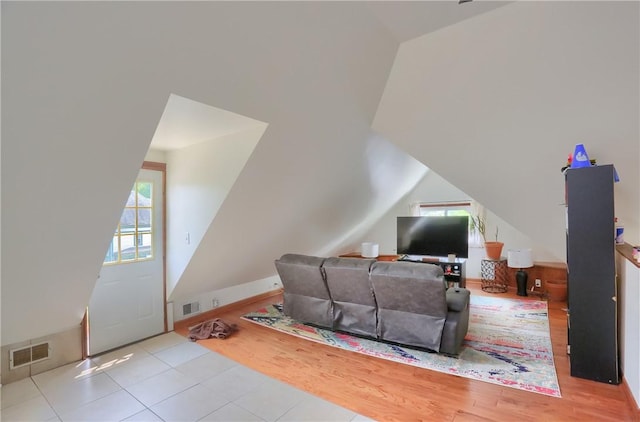 21 S Harrison Ave, Bellevue, PA 15202 - living room with wood finished floors and vaulted ceiling