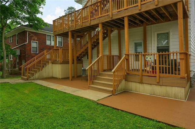 21 S Harrison Ave, Bellevue, PA 15202 - back of house with stairway, a yard, and a wooden deck