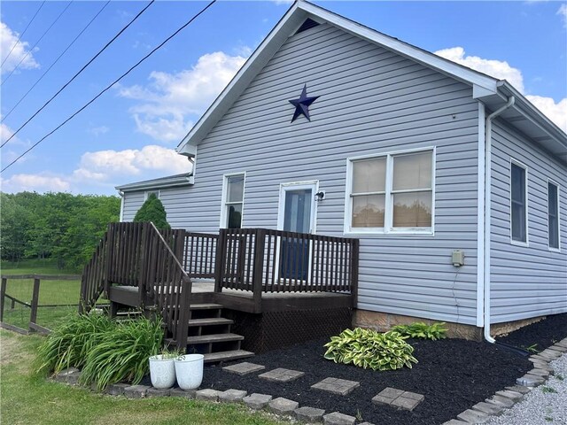 254 Bicker Rd, Winfield Twp, PA 16023 - rear view of house with a deck